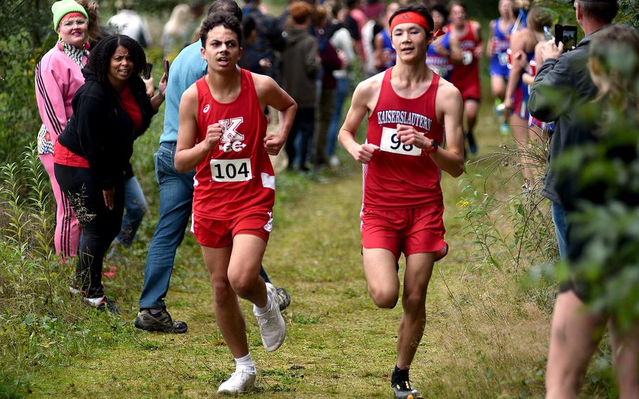 Kaiserslautern teammates Kai Kutz, left, and Leo Schell run together at a cross country meet on Sept. 14, 2024, at Ramstein High School on Ramstein Air Base, Germany.