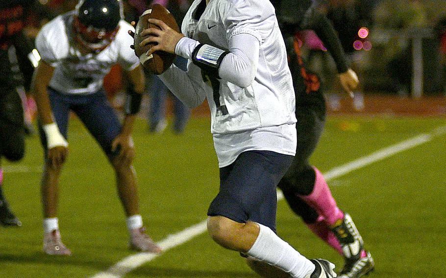 Parker Grimm looks for an open receiver.