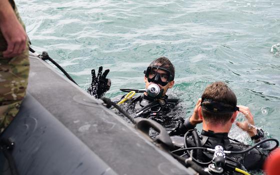 Sailors assigned to Explosive Ordnance Disposal Mobile Unit 8 conduct emergency action plan drills with the Bulgarian, Japanese and Ukrainian dive teams while underway off the coast of Varna, Bulgaria as part of Sea Breeze 2024, Sept. 10, 2024. 