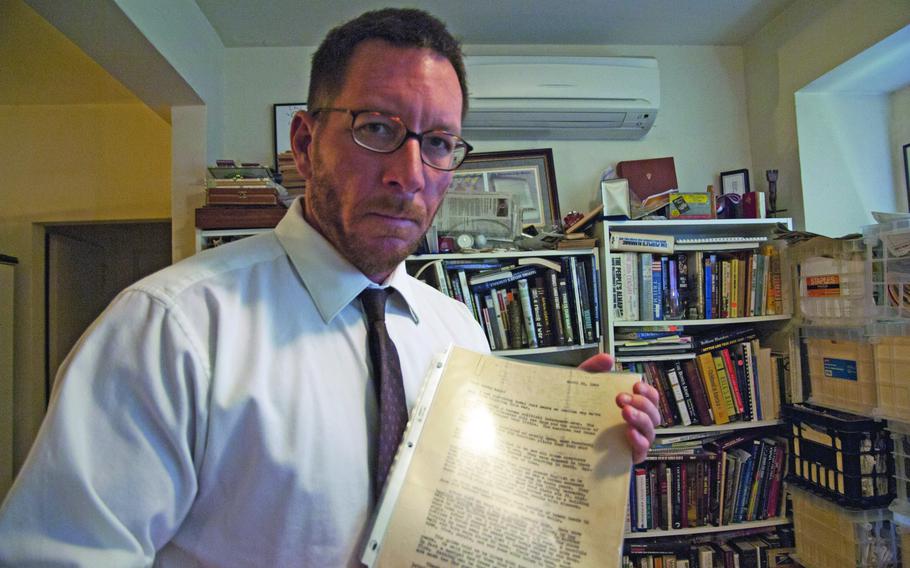 Andrew Carroll, founder of the Legacy Project, poses with a letter written by a U.S. service member in April 21, 1945, that helped inspire the effort to start collecting letters written by troops during the nation’s conflicts. The service member was a distant cousin of Carroll’s. 