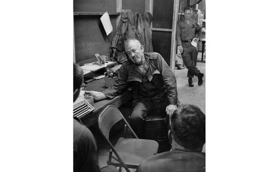  An Khe, South Vietnam, December 1966: Author John Steinbeck, 1962 Nobel Prize in Literature recipient, sits on a little green trunk as he answers questions from the men of the 1st Air Cavalry Division at An Khe, South Vietnam. Steinbeck visited Vietnam to learn and write about war. Asked about a question raised by a popular US magazine, "Is the U.S. locked in a hopeless war?" Steinbeck answered "All wars are hopeless, but all of the wars have been necessary and this one is also necessary." Steinbeck's son, John, was drafted into the U.S. Army in 1965 and was in country at the time of his father's visit. 

Read Stars and Stripes' article on Steinbeck's visit here.

https://www.stripes.com/migration/war-hopeless-but-necessary-steinbeck-says-1.84079

META TAGS: Pacific; South Vietnam; Vietnam War; author; writer; U.S. Army; 1st Air Cavalry