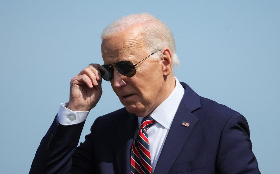 President Joe Biden arrives at Boston Logan International Airport in Boston on May 21, 2024. 
