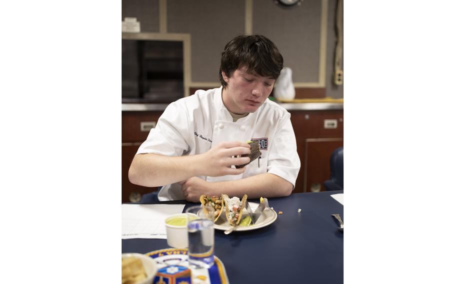 Chef Hayden Florence, tastes and judges a taco 