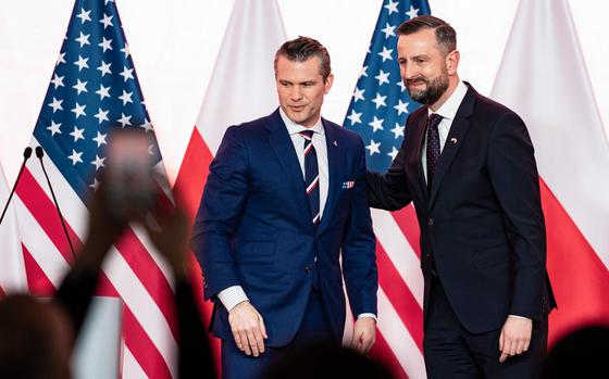 Pete Hegseth, US defense secretary, left, and Wladyslaw Kosiniak-Kamysz, Poland's defense minister, during a news conference in Warsaw, Poland, on Feb. 14. MUST CREDIT: Lemanski/Bloomberg