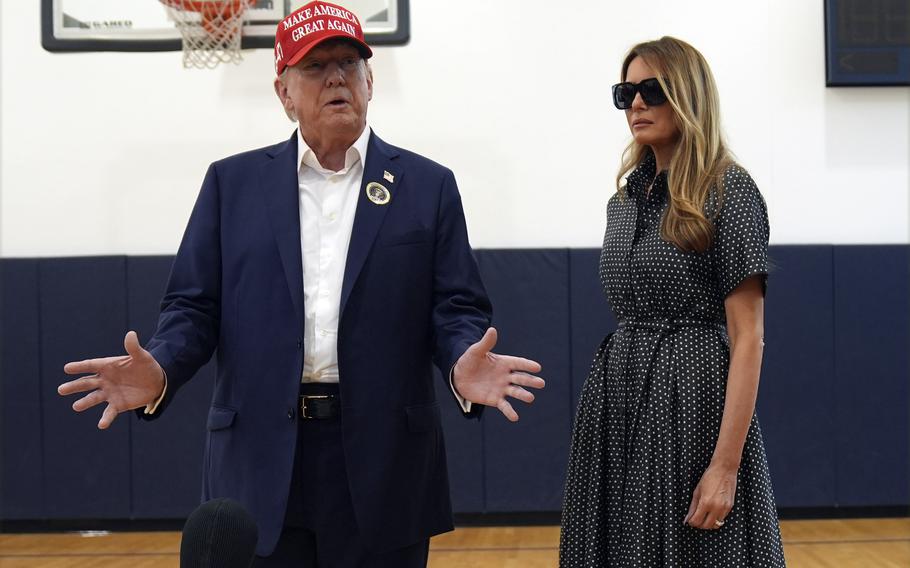 Former President Donald Trump and former first lady Melania Trump standing at a recreation center in Palm Beach, Fla., Nov. 5, 2024.