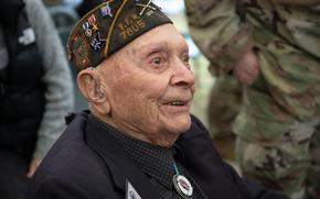 World War II veteran Ceo Bauer attends a D-Day commemoration event in Carentan, France, on June 2, 2024. The Michigan native, who is 101 years old, served with the 95th Infantry Division and helped liberate the French city of Metz from German occupation. With the youngest veterans of the war approaching 100, commemorations in Normandy this year were an opportunity to pass the living memory of the period on to younger generations.