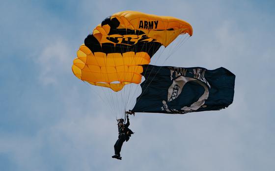 A member of the U.S. Army Golden Knights parachute team performs June 9, 2024, at an air show at Selfridge Air National Guard Base in Michigan.