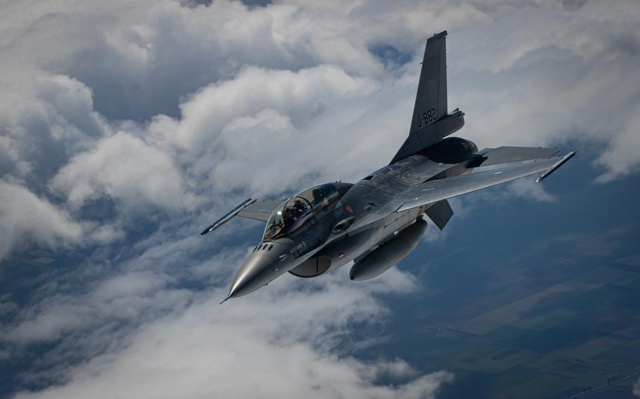 A Romanian air force F-16 fighter jet flies over Bucharest, May 13, 2024. The U.S. recently approved a $180 million missile sale to Romania, as the country works to meet NATO's 2% defense spending target. 