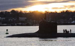 The Virginia-class fast-attack submarine USS Indiana (SSN 789) makes its way down the Thames River after departing Submarine Base New London in Groton, Conn., for routine operations on Tuesday, Nov. 29, 2022. Indiana is the 16th Virginia-class submarine and is third U.S. Navy vessel named in honor of the Hoosier State. (U.S. Navy Photo by John Narewski)