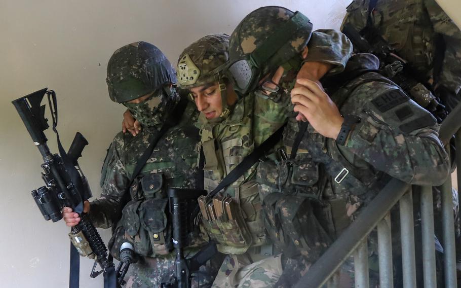 Soldiers from South Korea’s 5th Engineer Brigade carry a simulated casualty from the U.S. 2nd Infantry Division while training at the Rodriguez Live Fire Complex in Pocheon, South Korea, July 18, 2024. 