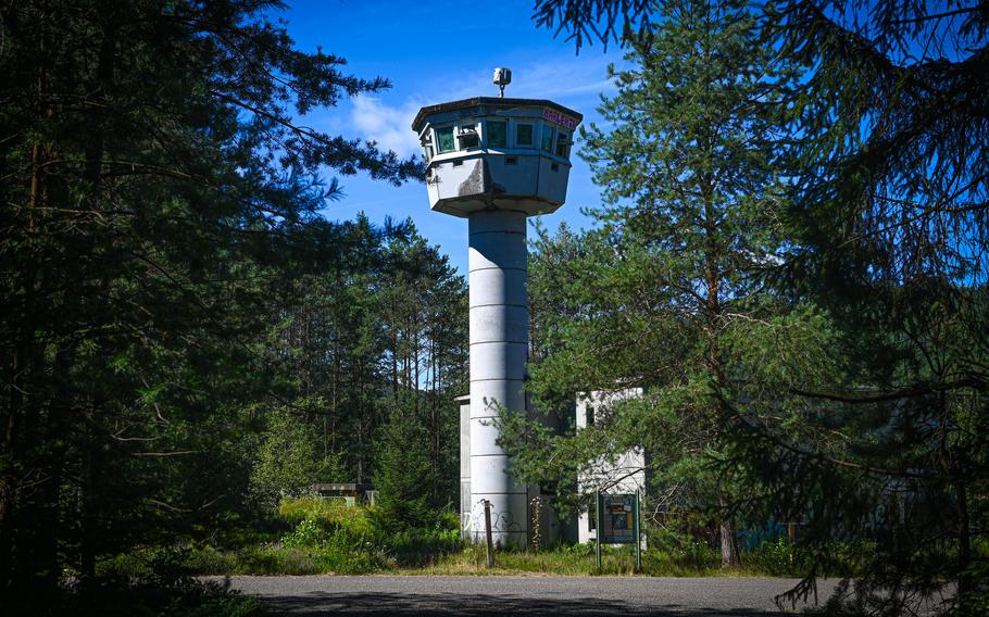 The guard tower of Area 1 near Ludwigswinkel, Germany, framed through foliage on Aug. 9, 2024. The structure once watched over one of the largest U.S. Army ordnance depots in Germany.