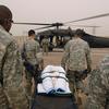 HED: Carrying hope, 2008

Jisr Diyala, Iraq, May 18, 2008: Sgt. Dontre Robinson, Spc. Christopher Pay, Sgt. 1st Class James Toone and Sgt. George Alonzo, from the left, all combat medics for 1-35 Armor, carry Mariam, a seven month old Iraqi child, to a Blackhawk for evacuation to a hospital at Balad Air Base from Combat Outpost Cashe in Jisr Diyala, Iraq.  The malnourished and dehydrated child who received a shunt in the brain five months ago is nearing critical condition.  Maj. (Dr.) Felix Oduwa, the doctor for 1-35 Armor, lobbied for American treatment fearing that the child would die if turned away.


Read the story here. 
https://www.stripes.com/news/2008-05-20/the-medical-rules-of-engagement-1938109.html1

META TAGS: Wars on Terror; humanitarian aid; Operation Iraqi Freedom; military medical