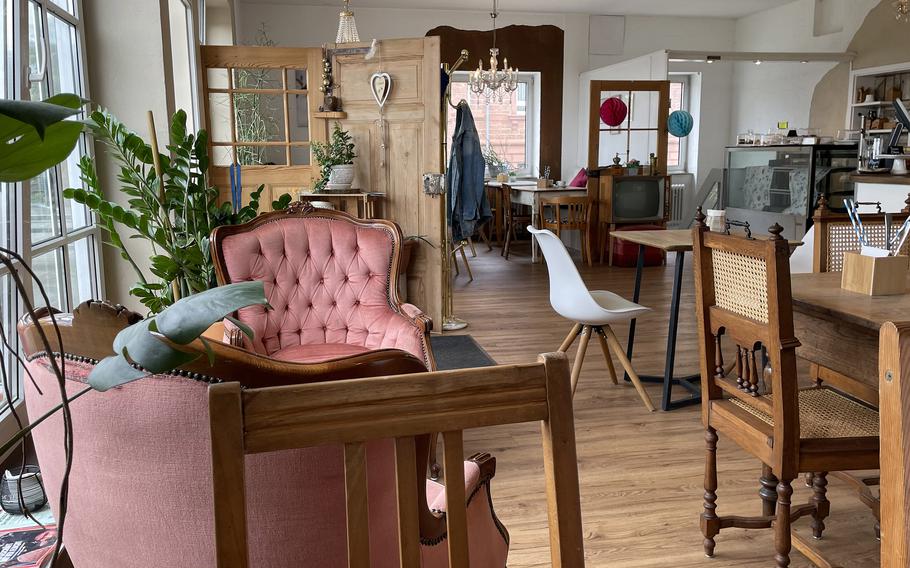The Corner Cafe in Otterbach, Germany, offers savory Venezuelan food and decadent desserts, including cake, cookies and ice cream. An eclectic mix of antique and country-style furniture and light fixtures gives it a cozy feel.