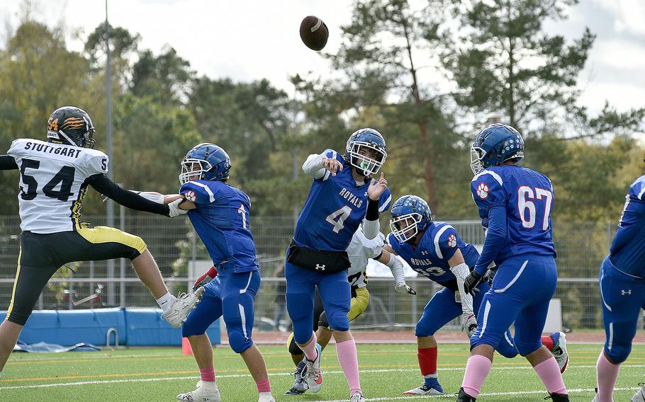 Quarterback Lucas Hollnebeck throws a pass during the first half of the Royal's Division I semifinal game against Stuttgart on Oct. 21, 2023, at Ramstein High School on Ramstein Air Base, Germany.