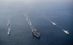 The aircraft carrier USS George Washington leads U.S., Japanese and South Korean destroyers in formation during Freedom Edge 24-2 in the East China Sea, Nov. 13, 2024.