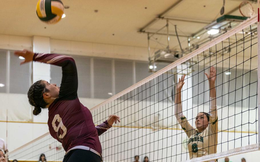 Zama’s Keisha Steele-Loli spikes against Robert D. Edgren’s Amber Baltazar during Friday’s DODEA-Japan volleyball match. The Trojans won in straight sets.