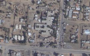 This satellite photo from Planet Labs PBC shows the Saudi Teaching Maternal Hospital, center, in El Fasher, Sudan, Saturday, Jan. 25, 2025. (Planet Labs PBC via AP)