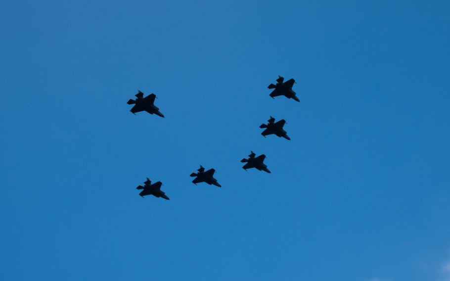 Six F-35B Lightning II fighter jets fly in formation over USS America in the Philippine Sea on Monday, Feb. 17, 2025. 