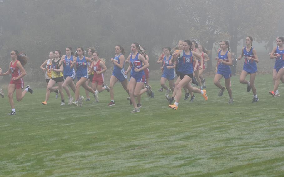 The girls field starts off the race.