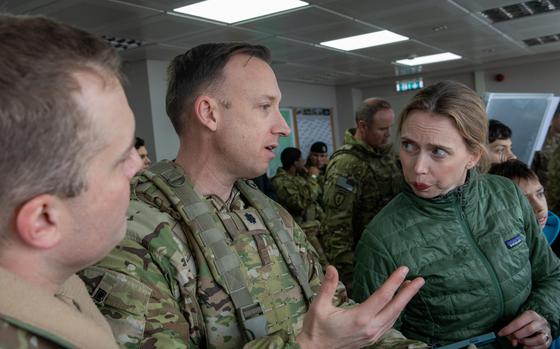 Lt. Col. David Griffith, Lt. Col. Benjamin Maher, and U.S. Ambassador ...