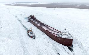 The freighter Herbert C. Jackson works to free itself from the ice, with help from the U.S. Coast Guard Cutter Bristol Bay, near Harsens Island, MI., Tuesday, Jan. 14, 2025. The ship is currently stuck in the ice in the St. Clair River, near the southeast tip of Harsens Island.