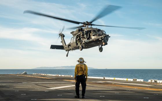 An Army Black Hawk lands aboard the USS Boxer in the Pacific Ocean in December 2023. MUST CREDIT: Cpl. Joseph Helms/15th Marine Expeditionary Unit