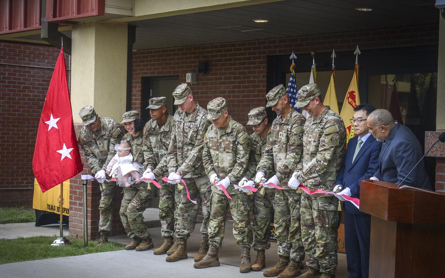 A ribbon is cut for Vera Tower, named for Medal of Honor recipient Army Pvt. Miguel Vera, at Camp Humphreys, South Korea, Sept. 13, 2024.