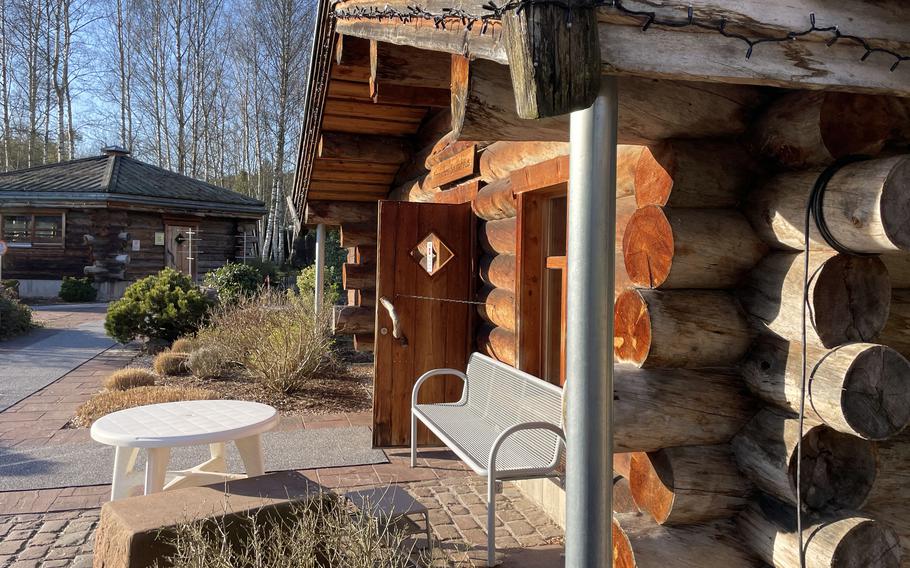 The sauna landscape at a A swimming complex with indoor and outdoor pools.