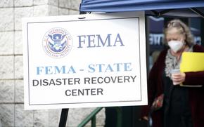 People gather at a FEMA Disaster Recovery Center at A.C. Reynolds High School in Asheville, N.C.,, Tuesday, Oct. 15, 2024.