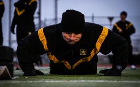 A soldier assigned to U.S. Army Southern European Task Force, Africa does hand release pushups during the Army Combat Fitness Test in Vicenza, Italy, Feb. 18, 2025. The ACFT could lead to an overall reduction in injury rates over time, according to a Rand Corp. study released March 10.