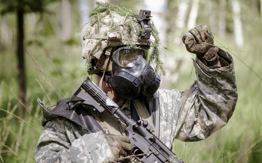 A soldier from U.S. Army Europe and Africa takes part in a team competition event Aug. 6, 2024, at Grafenwoehr Training Area in Germany.