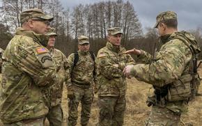Maj. Gen. Curtis Buzzard, second from right, visits soldiers at Grafenwoehr Training Area, Germany, on Feb. 6, 2024. Buzzard was nominated July 24 for a third star and an assignment as the leader of a Germany-based group providing military assistance to Ukraine, the Defense Department announced.