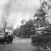 Saigon, South Vietnam, Feb. 27, 1962: A tank can be seen moving toward the Presidential Palace in Saigon, a Jeep already standing in front of the palace gates, as smoke and flames billow out of the west wing of the palace after it was hit during the Feb. 27, 1962 surprise strafing-bombing attack. The attack -- carried out by two dissenting Republic of Vietnam Air Force pilots -- killed three and wounded 30.

Stars and Stripes photographer Al Chang - in Saigon on another assignment that day - happened to be near the presidential palace early morning and rushed to the scene to document it. 

Although his original negatives are not in Stars and Stripes' archives, we do have three of the six original photo prints of the images that ran in the paper. The prints were created by Stars and Stripes Pacific's photo department at the time to run in the print newspaper and are often the only images we have of much of Pacific Stars and Stripes' news photography from the years prior to 1964 as the vast majority of pre-1964 Stars and Stripes Pacific negatives and slides were unwittingly destroyed by poor temporary storage in 1963.

Check out the images of the other two prints found, as well as the original published photo spread here. 

Looking for more Stars and Stripes’ coverage of the early days of the US involvement in Vietnam? Subscribe to Stars and Stripes’ historic newspaper archive! We have digitized our 1948-1999 European and Pacific editions, as well as several of our WWII editions and made them available online through https://starsandstripes.newspaperarchive.com/

META TAGS: Pacific; South Vietnam; Vietnam War; attack; bombing; Independence Palace bombing