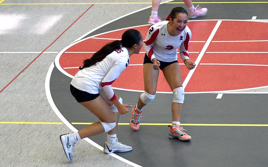 Kaiserslautern outside hitter Bianca Ocampo celebrates with teammate Kezley Kai following the final point in the first match of a doubleheader against Wiesbaden on Sept. 21, 2024, at Kaiserslautern High School in Kaiserslautern, Germany.