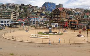 People walk past an independence square in Bukavu, eastern Congo, Saturday, Feb. 15, 2025. (AP Photo/Janvier Barhahiga)