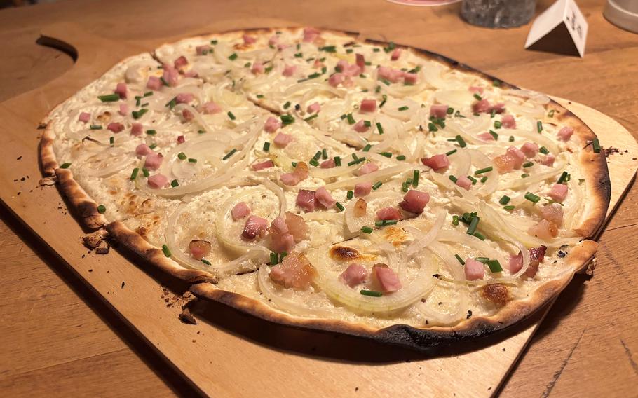 A whole flammkuchen with toppings