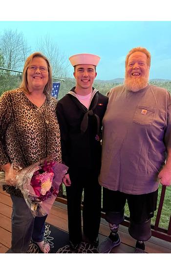 Seaman Recruit David “Dee” Spearman, center, with his parents, Nikki and Lee Spearman. Dee Spearman died on Aug. 1, 2022, after falling overboard from the destroyer USS Arleigh Burke into the Baltic Sea. Lee Spearman filed a $7 million wrongful death claim against the Navy on July 26, 2024.