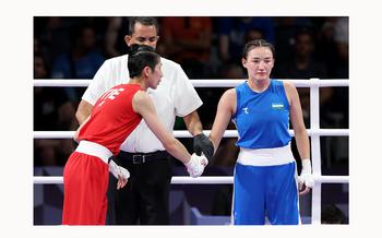 Taipei’s Yu Ting Lin, left, shakes hands with Uzebekistan’s Sitora Turdibekova as she looks away in the 57kg boxing match at the 2024 Paris Olympics Friday, Aug. 2, 2024.