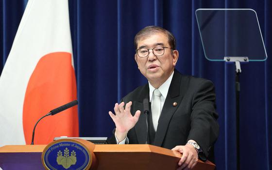 Japan's Prime Minister Shigeru Ishiba speaks during a press conference at the prime minister's office in Tokyo on Nov. 11, 2024. Ishiba kept his job in a parliamentary vote on November 11, despite having recently led the ruling coalition to its worst general election result in 15 years. (STR/JIJI Press/AFP/Getty Images/TNS)