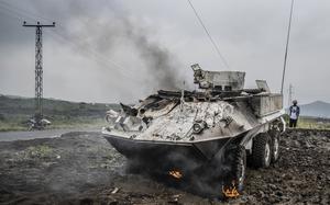 CAPTION CORRECTS YEAR A UN armoured personnel carrier burns during clashes with M23 rebels outside Goma, Democratic Republic of the Congo, Saturday, Jan. 25, 2025. (AP Photo/Moses Sawasawa)