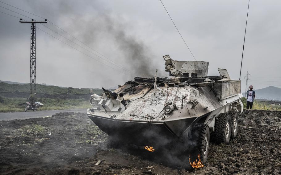 A UN armoured personnel carrier burns during clashes with M23 rebels outside Goma, Democratic Republic of the Congo, Saturday, Jan. 25, 2025.