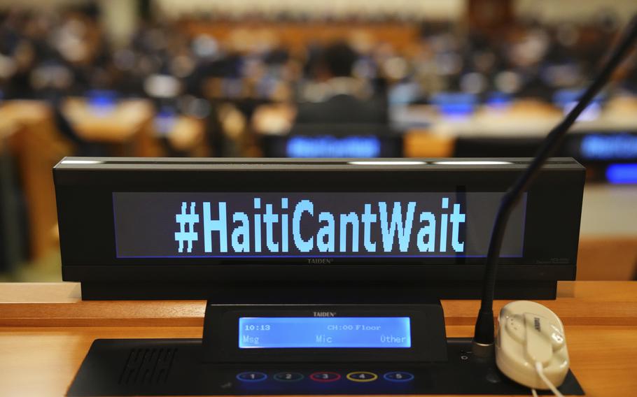 The social media slogan #HaitiCantWait is displayed as Canada Prime Minister Justin Trudeau takes part in high level meeting with an advisory group on Haiti at the United Nations headquarters.