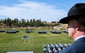 Cadets assemble at the U.S. Air Force Academy's Acceptance Day parade, which celebrates the completion of basic cadet training, in August 2024. The academy is one of the bases where a team will visit to check on compliance with executive orders related to diversity initiatives.