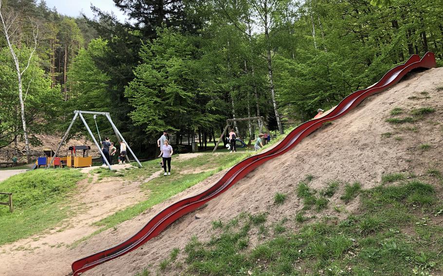 A forest playground greets families arriving at Bärenloch in Kindsbach, Germany.