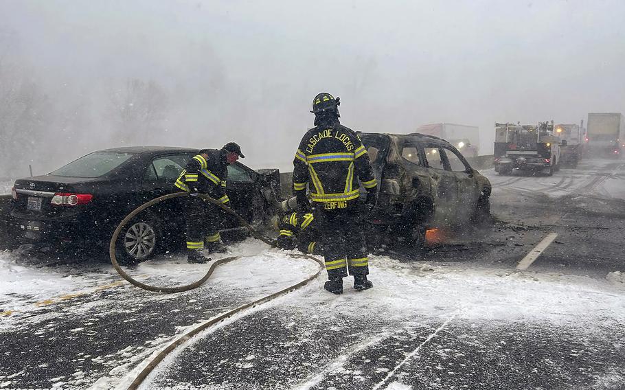 Emergency crews at the scene of a multi-vehicle pileup.