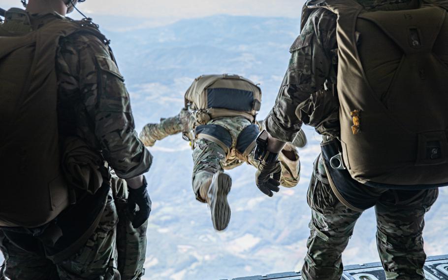 Green Berets from 1st Battalion, 10th Special Forces Group (Airborne) join Serbian counterparts in a jump over Pranjani, Serbia, on Sept. 21, 2024. The Defense Department is not doing enough to ease special operations forces service members' transition to civilian life, according to a Government Accountability Office report.