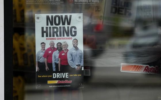 A hiring sign is displayed at a retail store in Buffalo Grove, Ill., Wednesday, Nov. 6, 2024. (AP Photo/Nam Y. Huh)