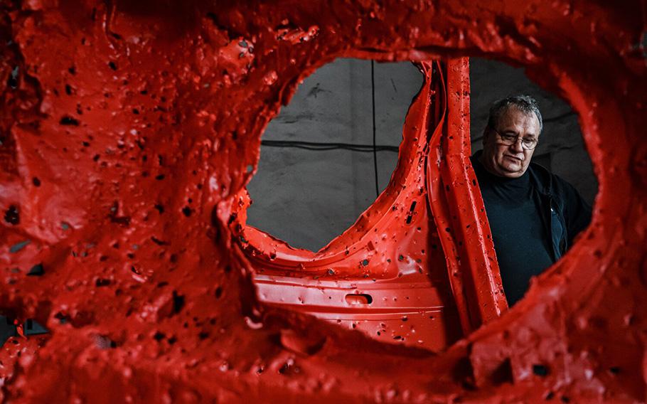 Mikhail Reva, a Ukrainian sculptor, looks over a piece of his artwork at his workshop in Odesa, Ukraine, on June 28, 2023. Before Russia invaded Ukraine, Reva’s sculptors were often playful and whimsical. The war changed all that. 