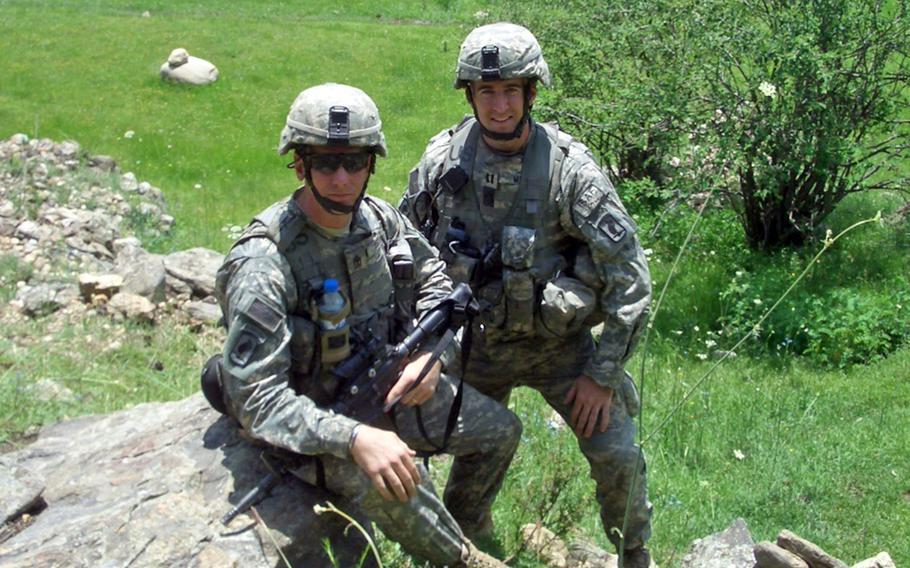 Then-Capt. Matthew Myer and 1st Sgt. Scott Beeson in Parun, Afghanistan, in June 2007. Now a colonel, Myer and Chief Warrant Officer John Hayes shared their experiences during the July 2008 Battle of Wanat with current 173rd Airborne Brigade paratroopers on July 1, 2024.