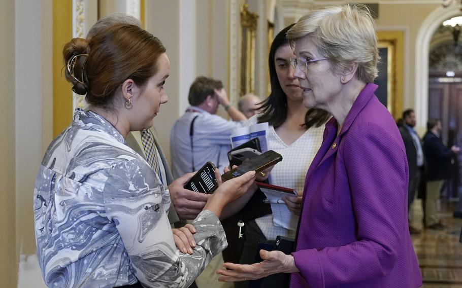 Sen. Elizabeth Warren, D-Mass., speaks to reporters, Wednesday, May 31, 2023, on Capitol Hill in Washington.